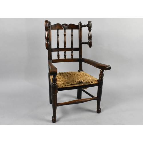 549 - A 19th Century Childs Ash and Elm Rush Seated Wing Back Kitchen Chair with Spindle Back and Front Su... 