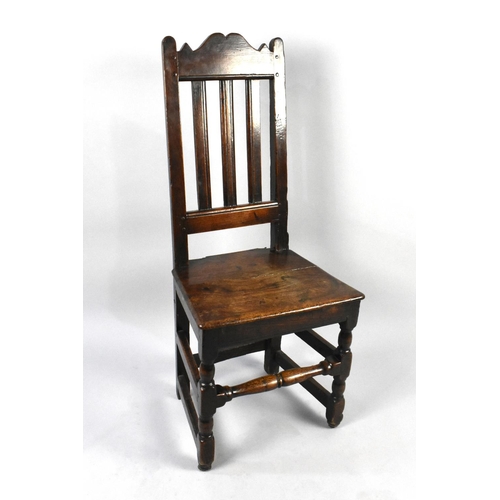 555 - An 18th Century Peg Jointed Chair with Slatted Back and Turned Supports, Condition Issues