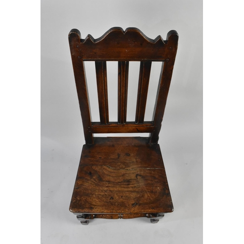 555 - An 18th Century Peg Jointed Chair with Slatted Back and Turned Supports, Condition Issues