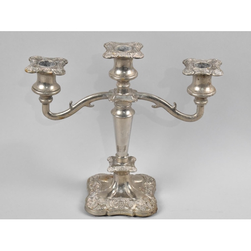 61 - A Silver Plated Three Branch Candelabra, 25cms High