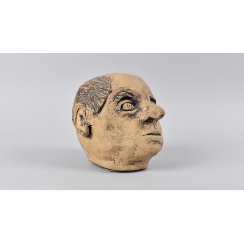 68 - A Studio Pottery Study of a Head, 12cms High