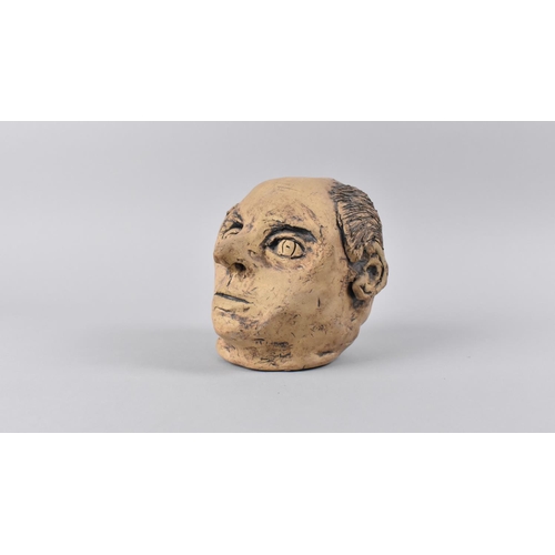 68 - A Studio Pottery Study of a Head, 12cms High