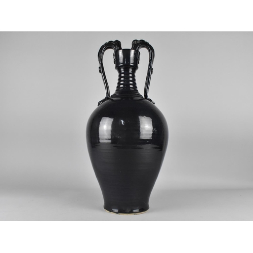 69 - A Large Studio Pottery Glazed Vase of Amphora Form with Zoomorphic Twin Handles, 49cms High