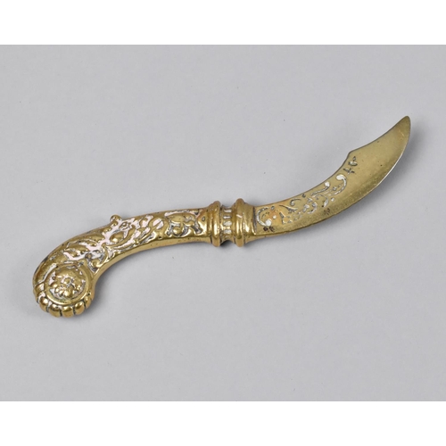 74 - A Cast Brass Ornate Study of a Dagger, 15cms Long