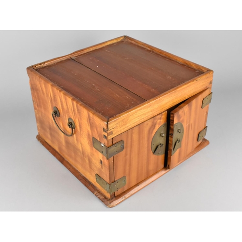 83 - A Chinese Camphor Wood Travelling Chest, Two Door Front Revealing Two Short and One Long Drawer, Met... 