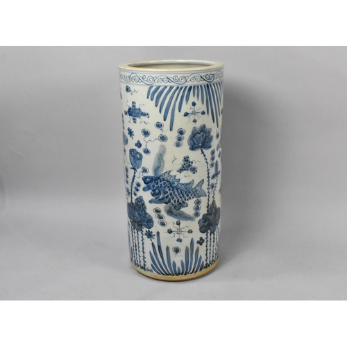 85 - A Reproduction Chinese Blue and White Porcelain Stick Stand, 59cms Wide