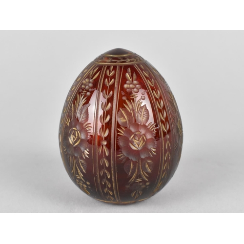 387 - A Faberge Style Ruby Glass Egg, 6cms High