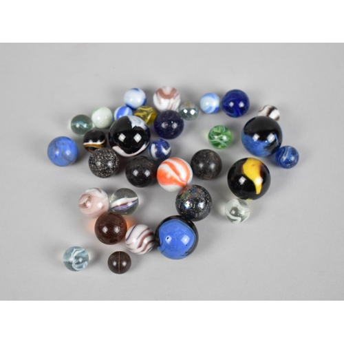 123 - A Collection of Various Vintage Marbles Etc