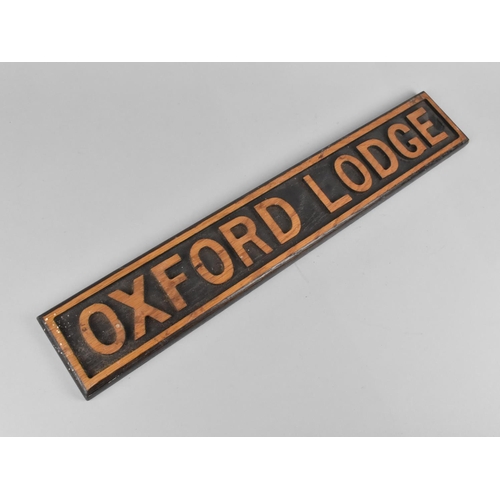 138 - A Wooden Sign for Oxford Lodge, 51.5cms Wide