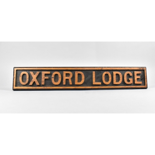 138 - A Wooden Sign for Oxford Lodge, 51.5cms Wide