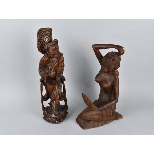 162 - A Chinese Wooden Carving of Immortal (AF) together with a Far Eastern Carving of a Nude Lady Admirin... 