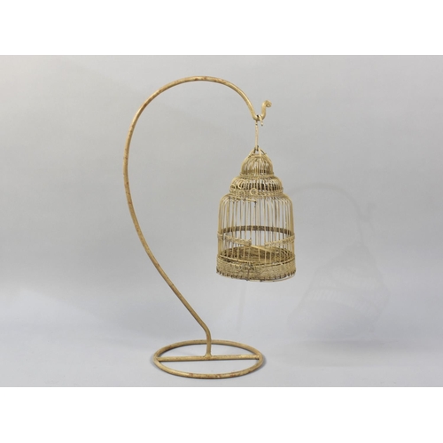 207 - A Wrought Metal Birdcage on Stand