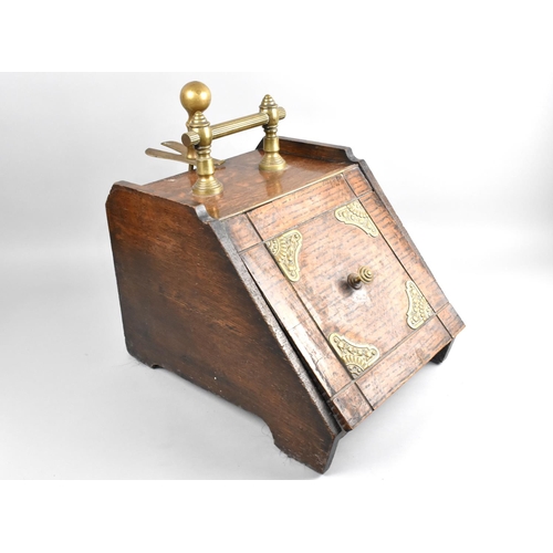 223 - An Early 20th Century Oak and Brass Mounted Coal Scuttle, 32x37cms High