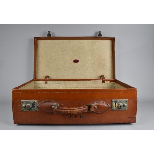 224 - A Vintage Leather Travelling Case Monogrammed TFG, 60cms Wide