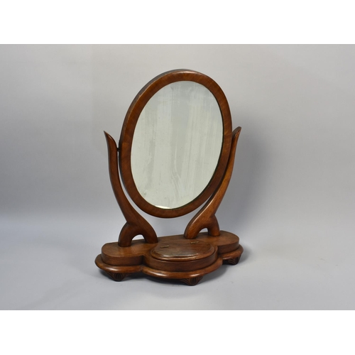 232 - A Victorian Mahogany Framed Oval Mirror on Stepped Base with Hinged Lidded Well, 51cms High