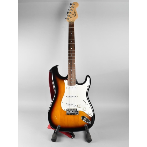 243 - A Fender Squier Stratocaster Electric Guitar