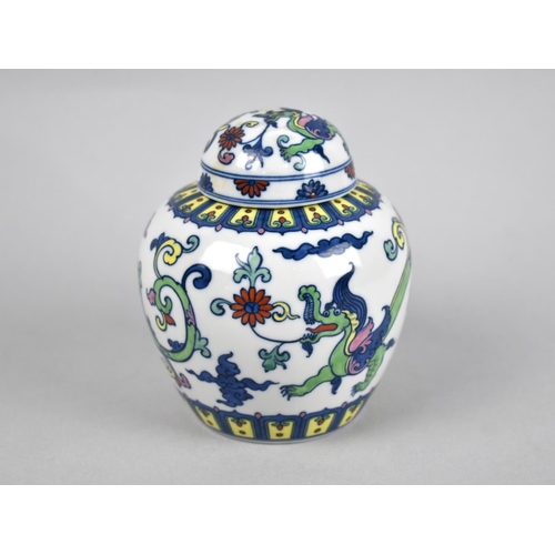 251 - An Oriental Porcelain Ginger Jar and Cover Decorated with Dragons and Scrolls, 7cms High