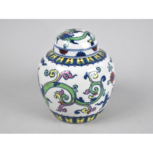 251 - An Oriental Porcelain Ginger Jar and Cover Decorated with Dragons and Scrolls, 7cms High