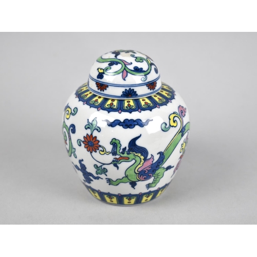 251 - An Oriental Porcelain Ginger Jar and Cover Decorated with Dragons and Scrolls, 7cms High