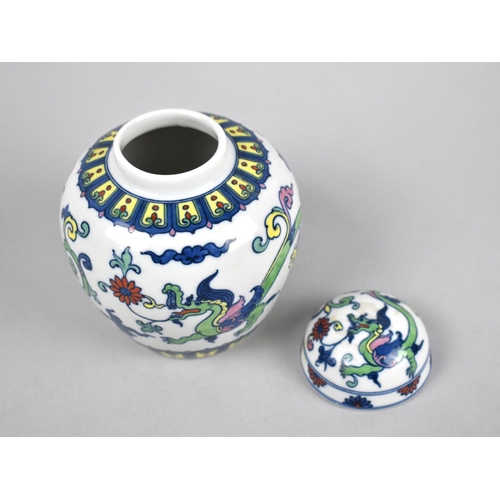 251 - An Oriental Porcelain Ginger Jar and Cover Decorated with Dragons and Scrolls, 7cms High