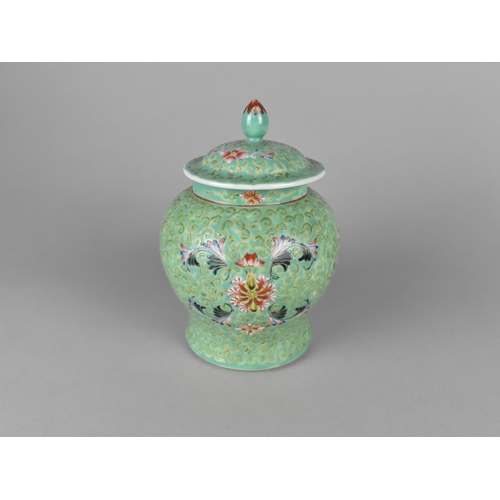 253 - A Chinese Porcelain Enamel Vase and Cover Decorated with Scrolls, Flowers and Bats on Blue Ground, 1... 