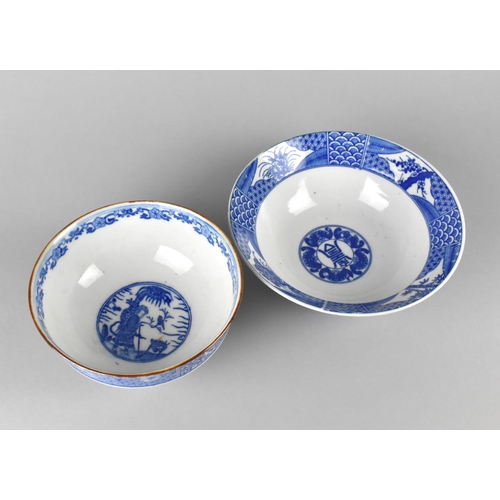 255 - Two Japanese Blue and White Bowls, One Decorated with Figures and Other with Floral and Foliage Desi... 