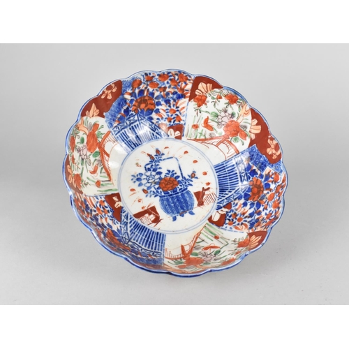 261 - A Japanese Porcelain Bowl with Scalloped Edge, 21.5cms Diameter