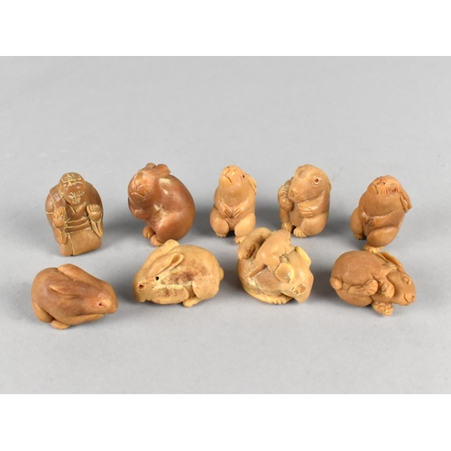 291 - A Collection of Nine Various Reproduction Faux Nut Carvings