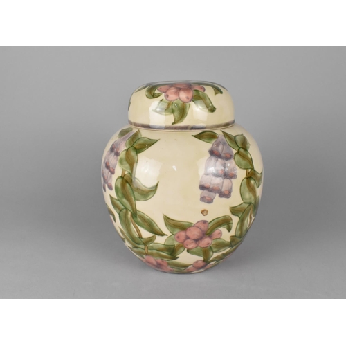 336 - A Cobridge Stoneware Ginger Jar, Foxglove Pattern, 20cm high