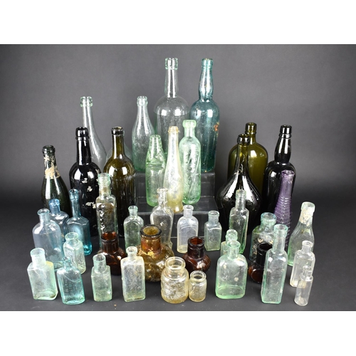 352 - A Collection of Various Glass Bottles, Pots etc