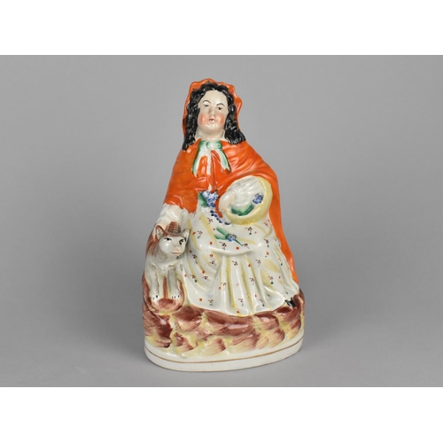 371 - A Staffordshire Study of Red Riding Hood, 23cms High