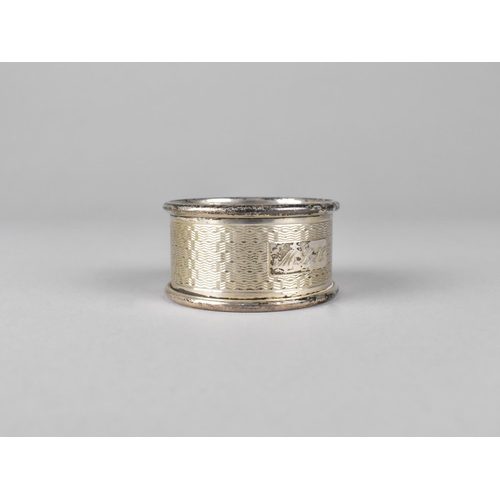 391 - A Silver Napkin Ring with Engine Turned Engine Decoration, Sheffield Hallmark