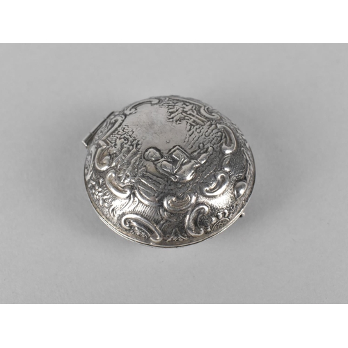 394 - A White Metal Pot with Hinged Cover Decorated in Relief with Figure in Exterior Setting