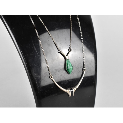 404 - A Silver and Malachite Pendant Necklace Together with a Black Stone Example