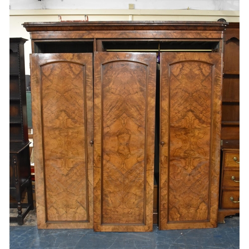 485 - A Victorian Burr Walnut Triple Wardrobe with Panelled Doors to End Fitted Section with Three Slides ... 