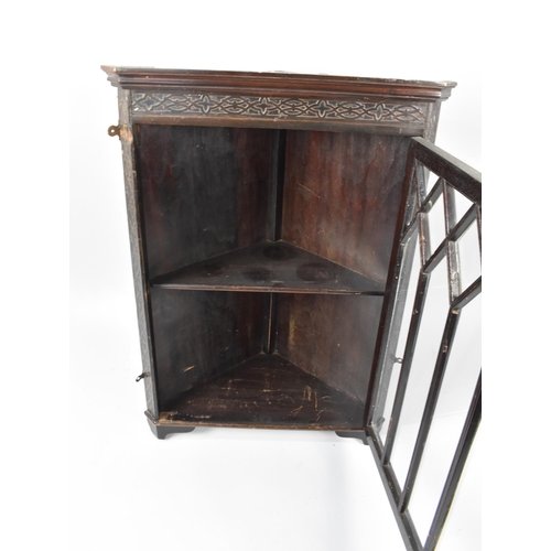 486 - A 19th Century Wall Hanging Glazed Corner Cabinet with Blind Carved Chamfered Sides and Top Rail, 51... 