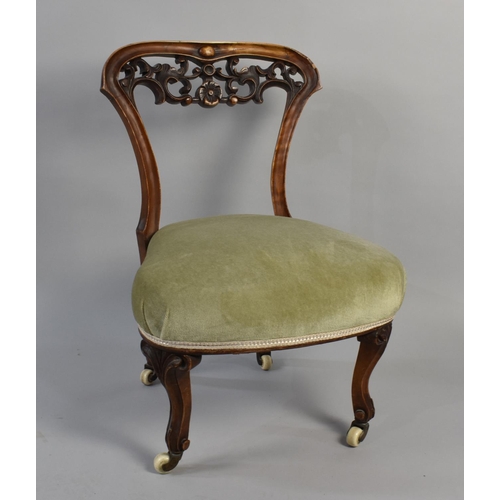 508 - A Late Victorian Ladies Nursing Chair with Carved Top Rail