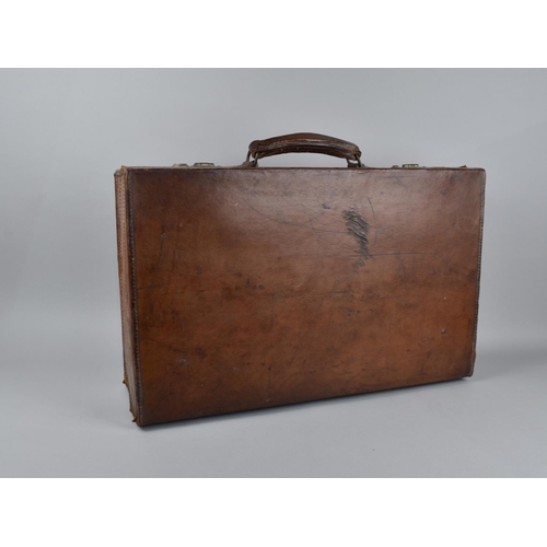 518 - A Vintage Leather Suitcase by Legge, 55.5cms Wide