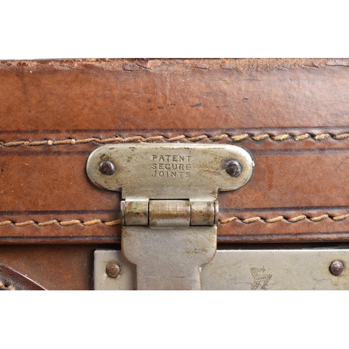 518 - A Vintage Leather Suitcase by Legge, 55.5cms Wide