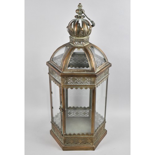 80 - A Reproduction Hexagonal Bronzed Metal and Glazed Lantern, 63cms High