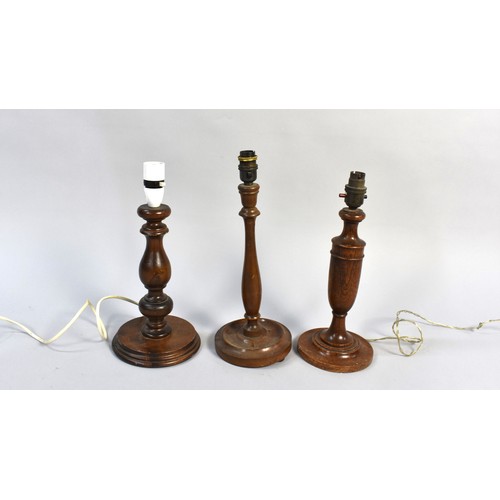 206 - Three Various Turned Wooden Lamp Bases