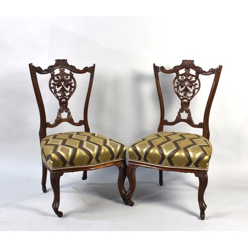 510 - A Pair of Edwardian Carved and Pierced Ladies Nursing Chairs with Short Cabriole Front Supports