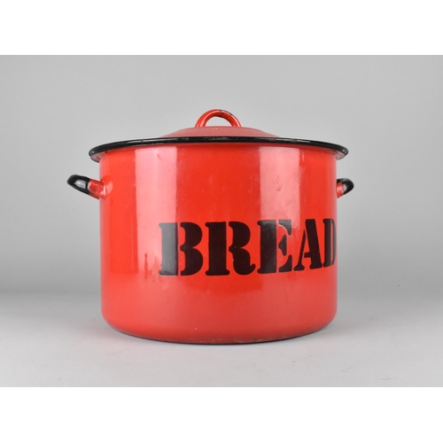 104 - A Mid 20th Century Red Enamelled Lidded Bread Bin, 29cms Diameter