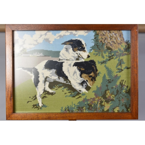 249 - A Framed Tapestry on Tripod Stand Depicting Terriers Rabbiting, 52cms by 36cms