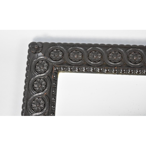 251 - An Edwardian Carved Framed Rectangular Wall Mirror, 65x78cms