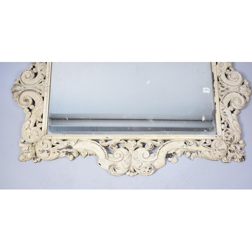 258 - A Large Cream painted Carved Wooden Framed Wall Mirror, 106cms by 77cms