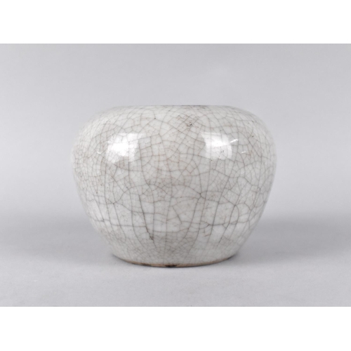 267 - A Chinese Monochrome Crackle Glazed Pot of Squat Form, 7cm high