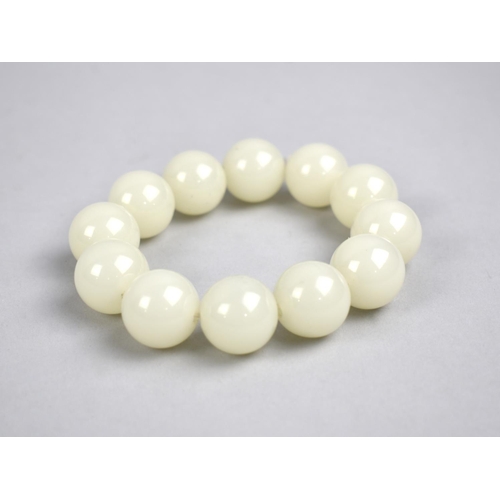 279 - A Jade Type Twelve Bead Bracelet