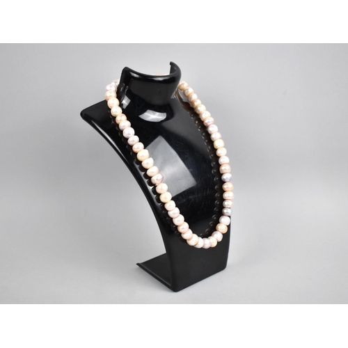 282 - A Pearl Necklace with Barrel Clasp