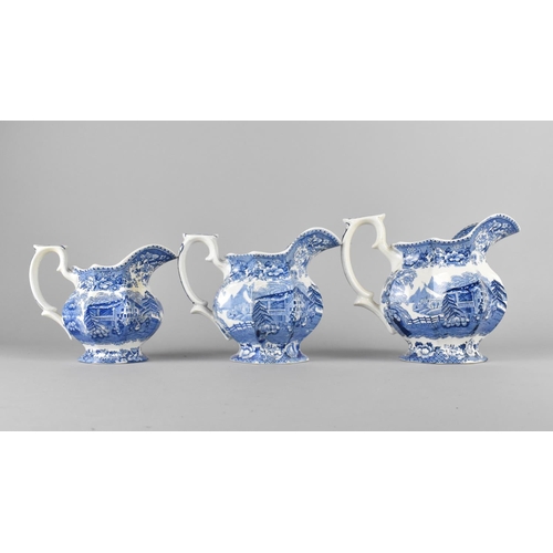 400 - A Set of Three Graduated Blue and White Jugs by T Hughes & Son, Longport, Swiss Pastimes, Tallest 17... 